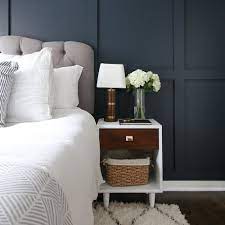 A simple bedroom with wooden panels on one side of the wall. Diy Wall Paneling In Bedroom Room For Tuesday