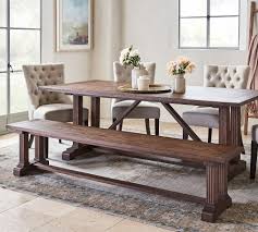 Grooves and saw marks create the look of salvaged lumber, and oversized bolts on the legs and surface add to its historic style. Livingston Extending Dining Table Hayes Chair Set With Bench Pottery Barn Dining Table With Bench Dining Table Rustic Dining Room Bench Seating