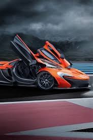 Follow the vibe and change your wallpaper every day! Mclaren P1 Orange Supercar Doors Opened 750x1334 Iphone 8 7 6 6s Wallpaper Background Picture Image