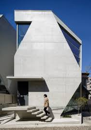 Atelier Tekuto S Exposed Concrete Home In Tokyo Displays A Chamfered Facade Architecture Facade Architecture Exposed Concrete