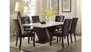 Don't forget dining room accessories like a wine rack or a bar cart. Majela Modern Marble Top Dining Table Set