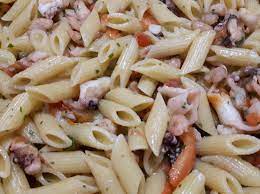 A spicy penne vodka with tomatoes and seafood. Ricetta Mezze Penne Ai Frutti Di Mare Dolcidee