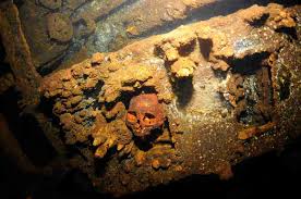 Haunting photos inside world's largest underwater graveyard packed with  skulls, planes and ships since World War 2 |