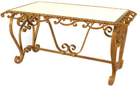 The best way to tie your room together is with a stylish coffee table. French Art Moderne Gilt Iron And Mirror Coffee Table 1
