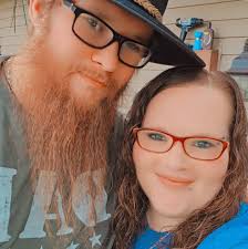 Adopting a small, low-shedding dog with a young adult age