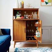 409 Likes 9 Comments West Elm Australia Westelmaus On Instagram Design To Impact Our Mid Centur Mid Century Bar Cabinet Modern Bar Cabinet Bar Cabinet