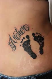 See more ideas about tattoos, baby feet tattoos, foot tattoo. Imprint Baby Feet Tattoo With Lettering Tattooimages Biz