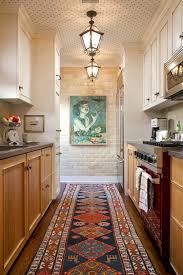 How to choose the most suitable rug for your kitchen. Pull It Off 9 Stylish Kitchens With Rugs Galley Kitchen Design Kitchen Style Stylish Kitchen