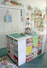 The stone buffet counter doubles as a durable workspace while a tall swivel chair can be used as a crafting chair or extra dining room seating. Craft Table With 4 Sets Of 3x3 Cubicles Great Idea For My Sewing Room Craft Room Design Sewing Room Inspiration Sewing Room Organization
