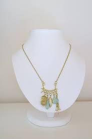 Pendentif En Laiton Cage Feuille Pierres Bleues Frais De Port Inclus De La Boutique Bijouxacanthe Sur Etsy Jewelry Etsy Gold Necklace