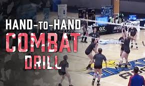 Hand To Hand Combat Drill To Train Overhead Hands On Defense The Art Of Coaching Volleyball Volleyball Training Coaching Volleyball Volleyball Practice