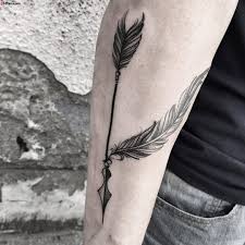 Miniature feather tattoos are often worn by ladies and girls. Amazing Arrow With Feather Tattoo On Men Sleeve Segerios Com