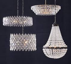 Contemporary chandeliers dazzle heavenly charm living rooms. Arden Crystal Chandelier Crystal Chandelier Chandelier Wood Bead Chandelier