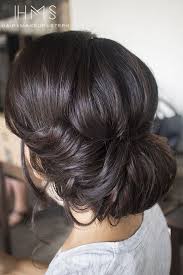 The elegant hairstyles feature a smoothly textured updo with a low bun tied. Bluehost Com Hair Styles Hair Long Hair Styles