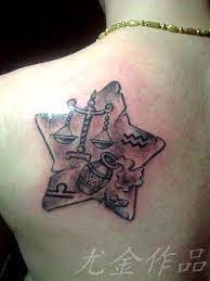 Free Tattoo Designs Libra Tattoo Design On The Back With Star Libra Tattoo Pisces Tattoo Designs Zodiac Tattoos