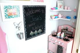 I read through all of your comments, and got inspiration from some of the suggestions. A Kitchen In A Closet Pink Play Kitchen Kids Room Design Little Girl Closet