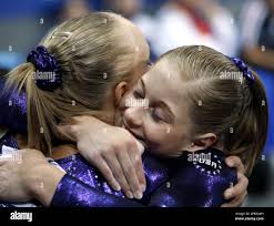 Shawn Johnson of the United States, right, hugs team mate Anastasia Liukin  after winning the gold medal in the Women's Individual All Around final of  the Gymnastics World Championships in Stuttgart, southern