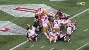 Christian McCaffrey SOARS over the goal line in LaDainian Tomlinson-esque fashion for TD