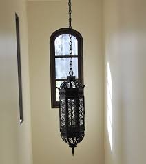 Illuminaries lighting provides the best in custom wrought iron lighting products and wrought iron outdoor lighting fixtures. Custom Wrought Iron Lights Hand Forged Chandeliers Hacienda Lights