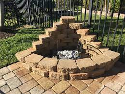 Diy Corner Fire Pit I Used Leftover Landscape Blocks And Made A Fire Pit In An Unused Area Of My Patio Since It W Diy Fire Pit Outdoor Fire Pit Backyard