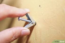 Anything you hang from a wall—whether is is a simple family picture or large wall shelf unit—will require that the item is attached directly and firmly, with the weight safely distributed. How To Hang A Heavy Picture 9 Steps With Pictures Wikihow Life