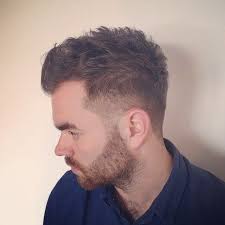 Men S Hair Heavy Low Fade With Texture On Top Great Haircut For Someone Wanting Easy Maintenance Wit Mens Haircuts Fade Mens Hairstyles Mens Hairstyles Fade