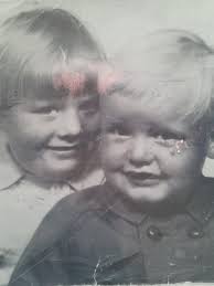 Hi everyone. Can you please help me with this damaged photo. It's of my  three kids and our cats. Can you possibly remove the scratches mainly