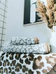 These sculpted jacquard towels, made in turkey, feature a raised pile leopard print design on an ombre pattern background offering a gentle scrub after a relaxing bath or shower. Leopard Jacquard Towels And Bath Mat Leopard Bathroom Soft Bath Mat Towel Bath Mats