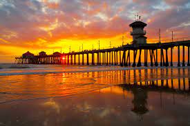From our perspective, the moon appears totally dark: The 10 Best Beaches To Watch The Sunset In California
