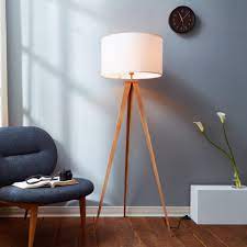 Floor lamps are a great way to bring additional lighting to a room. Wooden Tripod Floor Lamp With White Shade Teamson Home Uk