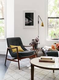Fauteuil Scandinave 10 Modeles Pour Un Salon Au Style Nordique Fauteuil Scandinave Idee Deco Appartement Fauteuil Salon