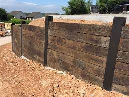 Wall Of Used Oak Railway Sleepers Slotted Into Rsjs Landscaping Retaining Walls Garden Retaining Wall Railway Sleepers