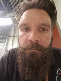 I wonder if there's a formal definition of the length and/or coverage  required for stubble to be considered beard?