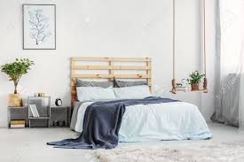 Bright Bedroom Interior With King Size Bed With Light Blue Bedding Stock Photo Picture And Royalty Free Image Image 112561196