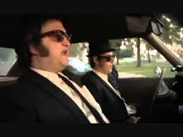 Hit it.[elwood drives the bluesmobile out of the tunnel, knocking the roofspeakers off as the mystery woman comes out and fires at them. Blues Brothers All The Epic Lines Youtube