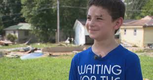 Ripped from his mother, 8-year-old boy survives Waverly flood alone