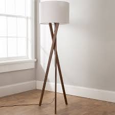 The wooden floor lamp has the elegant look that will surely create a natural yet modern ambiance to any contemporary homes today. Sleek Wood Modern Tripod Floor Lamp Wooden Tripod Floor Lamp Floor Lamp Bedroom Tripod Floor Lamps