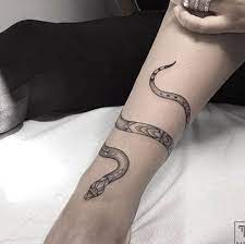90 Slithering Snake Tattoos For Men And Women To Wear In 2021 Around Arm Tattoo Wrist Tattoos For Women Feminine Snake Tattoo