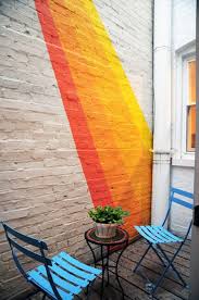 Red brick walls and blue door from chakadecor. Unique Ideas And Tips For Painting 70s Design Balcony Wall Exterior Paint