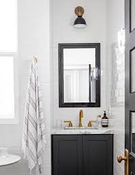 Using double sink vanity means two vanities are placed adjacent to one another and there is slight empty area between the placements of the sinks. 12 Vanity Lighting Ideas For A Beautifully Lit Bathroom Decor Report