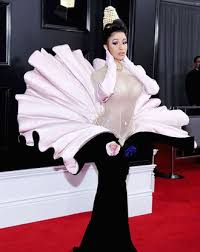 Those who were living for the theatricality of cardi b's vintage mugler haute couture red carpet look should be delighted that she wore four different outfits from for her performance, the rapper was in top showgirl form in vintage mugler fall 1995. 2019 Grammy Awards Cardi B Wears Oyster Dress