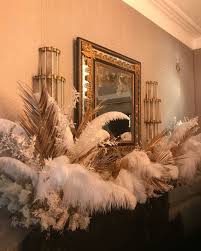 Kitten Grayson Flowers On Instagram Gilded Palms Bleached Ruscus And White Ostrich Feathers On The Mant Ostrich Feather Decor Feather Decor Ostrich Feathers