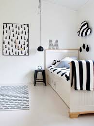 Polished kids' room in black, white and gray with hints of red and yellow [design: 10 Monochrome Kids Rooms Tinyme Blog