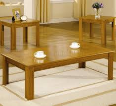 The clean white finish fits with any decorating scheme beautifully. Oak Finish Modern 3pc Coffee Table Set W Parquet Tops