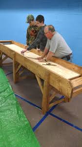 There is a white cue ball and ten other balls for two sides. New Youth Carpetball Table Westminster Church Pca