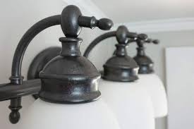 Consult an electrician with any questions before removing the fixture. Bathroom Light Makeover With Paint Girl Just Diy