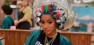 (designs by kylie, kendall jenner, ariana grande)! Cardi B Totally Nails This Odd Entertaining New Ad For Reebok Muse By Clio
