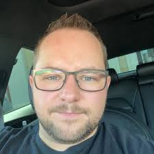 What is causing the weird rattling sound when revving the engine in a Kia  Stinger?