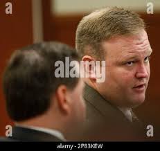 Former football coach David Jason Stinson looks