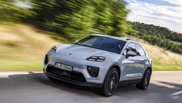 Porsche Macan Electric digital cockpit with dual-screen layout and premium materials
